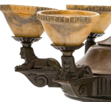 An Art Deco Egyptian Revival six-light patinated bronze and alabaster chandelier, 1920s