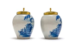 Pair of blue and white tobacco jars and brass covers, Delft,