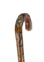 A carved fruitwood and metal-mounted horse-measuring stick, late 19th/ early 20th century,