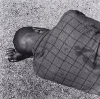 David Goldblatt; Man Sleeping, Joubert Park, Johannesburg, August 1975, Particulars Series