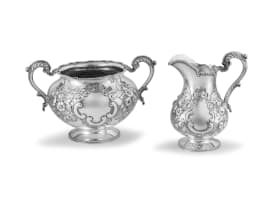 A Victorian silver-gilt two-handled sugar bowl and milk jug, Daniel & Charles Houle, London, 1864