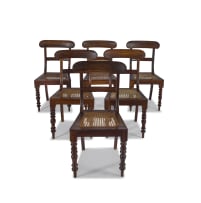 A set of six Cape Regency stinkwood dining chairs, late 19th century