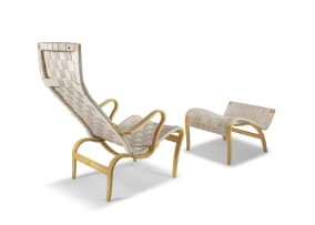 A Bruno Mathsson 'Pernilla' lounge chair and ottoman designed 1941 for Karl Mathsson, Värnamo, 1992, Sweden