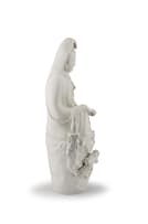 A large Chinese 'blanc-de-chine' figure of Guanyin, Qing Dynasty, early 20th century