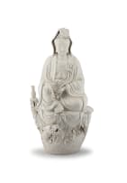 A large Chinese 'blanc-de-chine' figure of Guanyin, Qing Dynasty, early 20th century