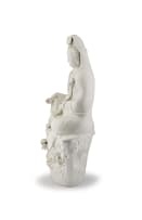 A large Chinese 'blanc-de-chine' figure of Guanyin, Qing Dynasty, early 20th century