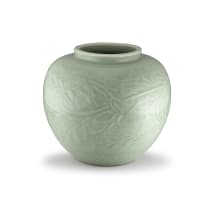 A carved 'Longquan' celadon-glazed floral jar, Ming Dynasty