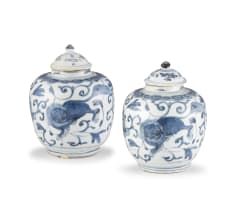 A pair of Chinese blue and white jars and covers, late Ming/early Qing Dynasty