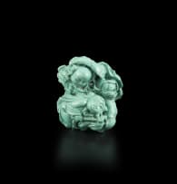 A Chinese carved turquoise figure, 19th century