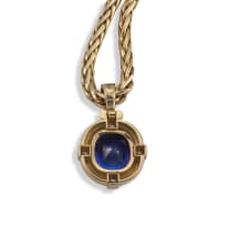 18k yellow gold tanzanite and diamond pendant and a pair of earrings, en suite, Charles Greig