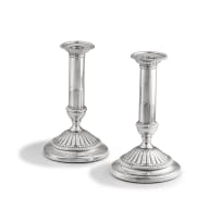 A pair of George III silver candlesticks, maker’s marks worn, London, 1801