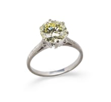 18k white gold light fancy yellow diamond solitaire