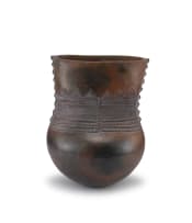 Jabulile Nala; Pit-fired earthenware vessel with shaped neck decorated with relief and incised geometric patterns