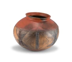 Clive Sithole; Smoke- and kiln-fired red ochre and earthenware pot with relief and incised geometric patterns