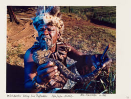 Obie Oberholzer; Witchdoctor Biting Live Puffadder. KwaZulu-Natal.