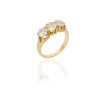 18k yellow gold three stone diamond ring