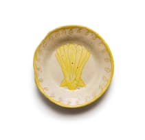 Hylton Nel; A yellow and cream plate with a shell motif