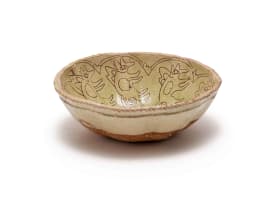 Hylton Nel; Light green bowl with abstract flying animal motif