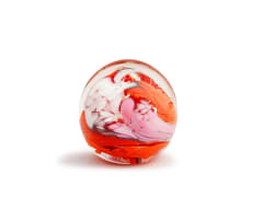 David Reade clear glass paperweight blown with white, red, pink and orange flowers