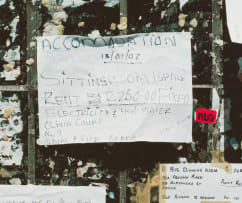 David Goldblatt; Adverts on the Wall at the Base of the Telkom Microwave Tower, Hillbrow, 15 January 2002