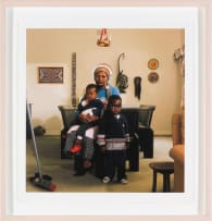 David Goldblatt; Victoria Cobokana, housekeeper, in her employers dining room with her son Sifiso and daughter Onica, Johannesburg, June 1999. Victoria died on AIDS on 13 December 1999, Sifiso died of AIDS on 12 January 2000, Onica died of AIDS in May 2000