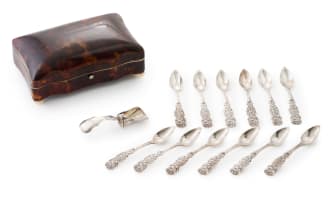 A set of twelve Dutch silver spoons with sugar scoop, Netherlands, .833 standard, early 20th century