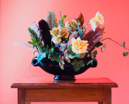 Sean Wilson; Foliage, Feathers, and Faux Flowers in Black Urn