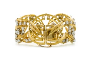 18k two-tone gold and diamond hinged bracelet