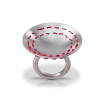 Silver ring with woven red running-stitch thread