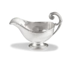 An Edward VII silver sauce boat, maker's mark worn, London, 1908