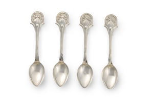 A set of four silver Voortrekker Monument Commemorative spoons, Thomas Gilpin Ltd, Sheffield, 1949