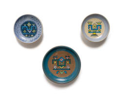 Kalahari Studio; Small plates decorated with Ndebele patterns, three