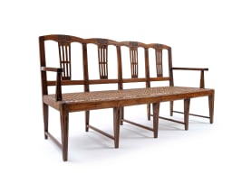 A Cape Neo-classical stinkwood, teak and fruitwood rusbank, early 19th century