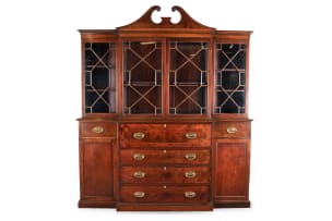 Georgian style flame mahogany breakfront secretaire bookcase, 19th century