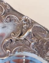 An Edward VII silver mounted easel-back mirror, William Comyns & Sons, Birmingham, 1901