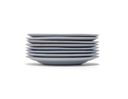Linn Ware/Ceramic Studio; Set of occasion plates with floral decoration, eight