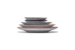 Linn Ware/Ceramic Studio; Plates decorated with Ndebele domestic scenes, five