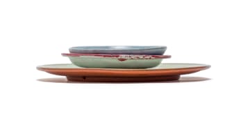 Linn Ware/Ceramic Studio; Plates with nature inspired decoration, three