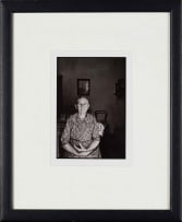 David Goldblatt; Ouma Hester Mostert, who came from Calitzdorp to Gamkaskloof as a 17-year-old bride, sitting at the door of her voorkamer. I asked if she would allow me to make a photograph of her. Would I send her a copy? she replied. I said: Yes, in about about three months' time. Don't worry. I'll be dead then, she said. The photograph was made on or about 1 January. She died on 7 April. Gamkaskloof, Cape Province (Western Cape), 1968