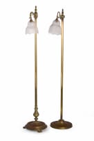 Near pair of brass standing lamps with glass shades, 19th century