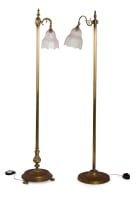 Near pair of brass standing lamps with glass shades, 19th century