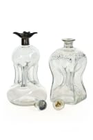 A George V glass silver-mounted decanter, Hukin & Heath, Birmingham, 1925; and another