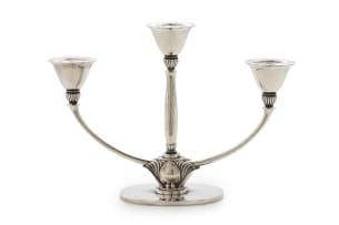 A Georg Jensen silver candelabra, designed by Gundorph Albertus, 1887- 1970