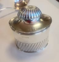 An Edward VII silver tea caddy, George Unite, Chester, 1903