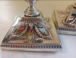 A near pair Victorian silver candlesticks, Hawksworth Eyre & Co Ltd, Sheffield 1899 and 1900