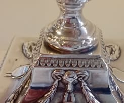 A near pair Victorian silver candlesticks, Hawksworth Eyre & Co Ltd, Sheffield 1899 and 1900