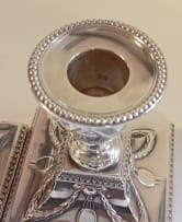 A near pair Victorian silver candlesticks, Hawksworth Eyre & Co Ltd, Sheffield 1899 and 1900