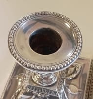A near pair Victorian silver candlesticks, Hawksworth Eyre & Co Ltd, Sheffield 1899 and 1900