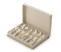 A set of six silver and abalone spoons