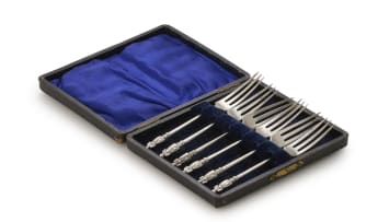 A set of six George V silver teaspoons and six Walker and Hall Apostle forks, Sheffield 1915